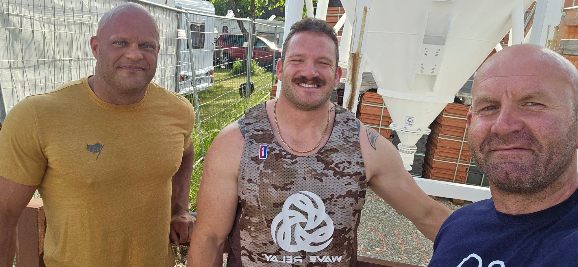 Me, Harry and Chris smiling together outside the festival area
