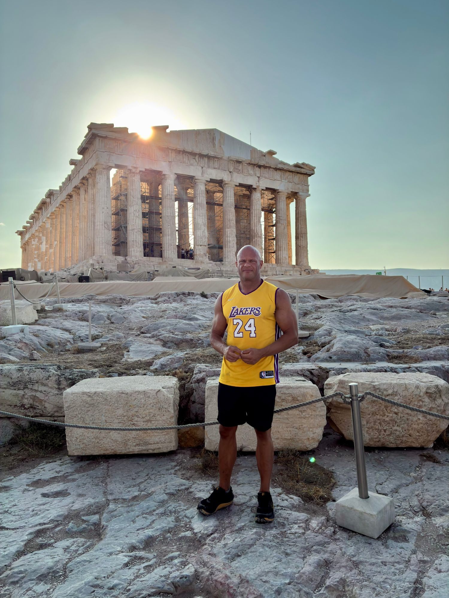 Standing in front of the Parthenon with the morning sun behind it